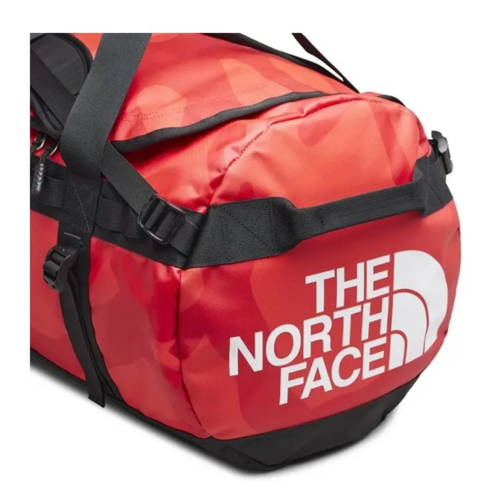 NWT 2022 KAWS x THE NORTH FACE MEDIUM RED DUFFLE BAG BRILLIANT CORAL 86 PRINT